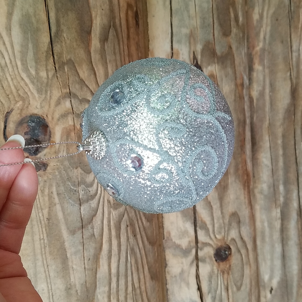 Sparkly, glittering, silver, large Christmas tree ball.